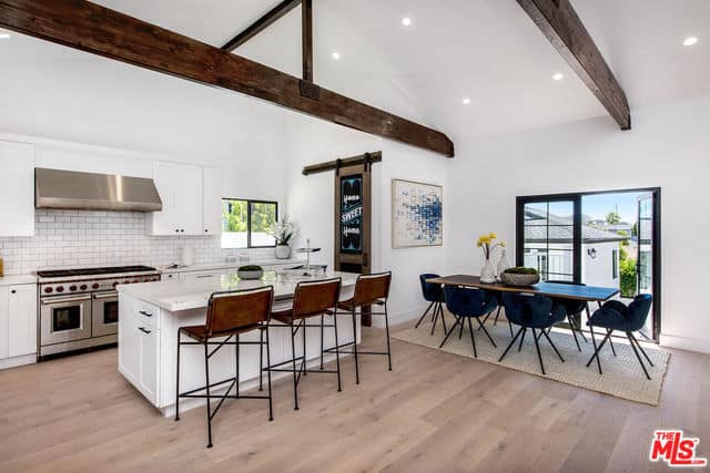 Single-Level Home with Dramatic Vaulted Beam Ceiling, French White Oak Flooring, and Shiplap Detailed Walls