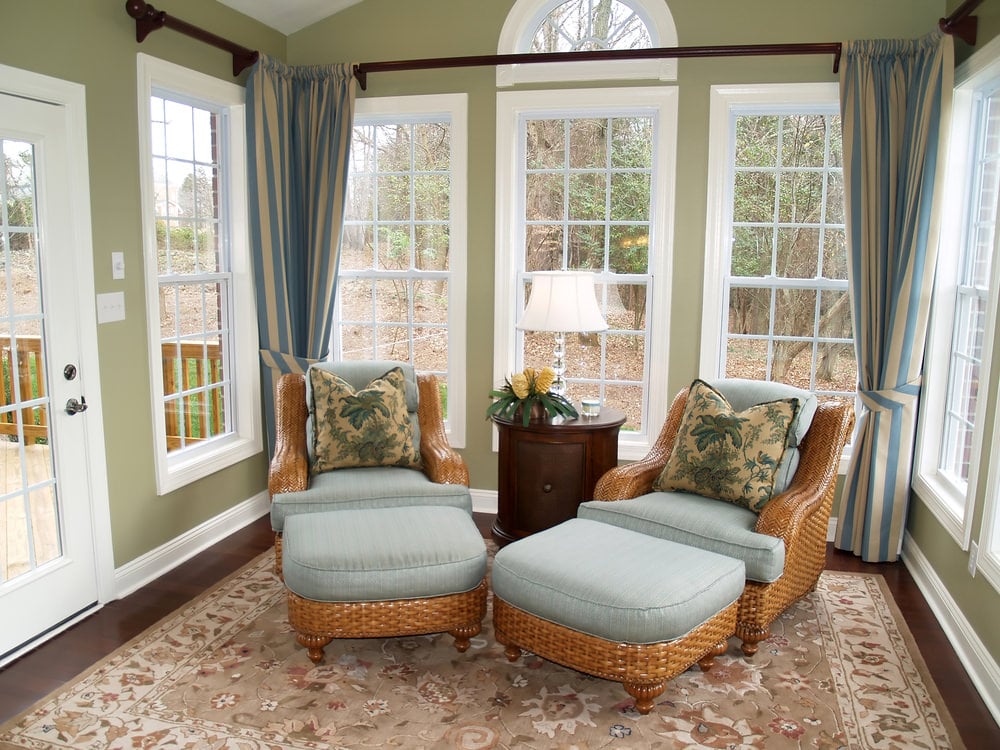 Medium-sized room in a country-style aesthetics. The hardwood floor is carpeted for that beautiful and elegant finish.